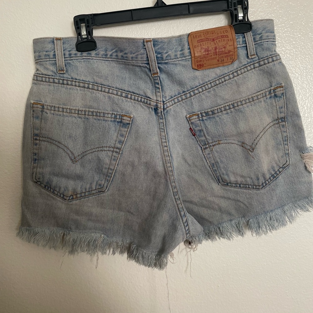 Levi’s distressed denim shorts
W34 L30